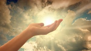 Hand, sun, and sky