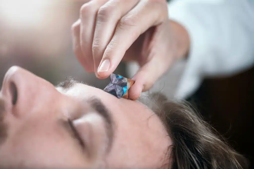 Young man with crystals
